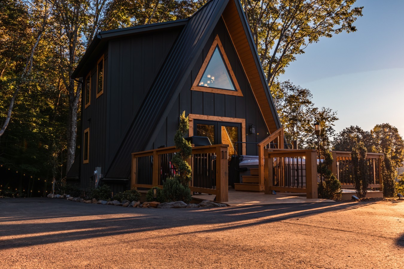 Cabin entrance and front porch at sunset