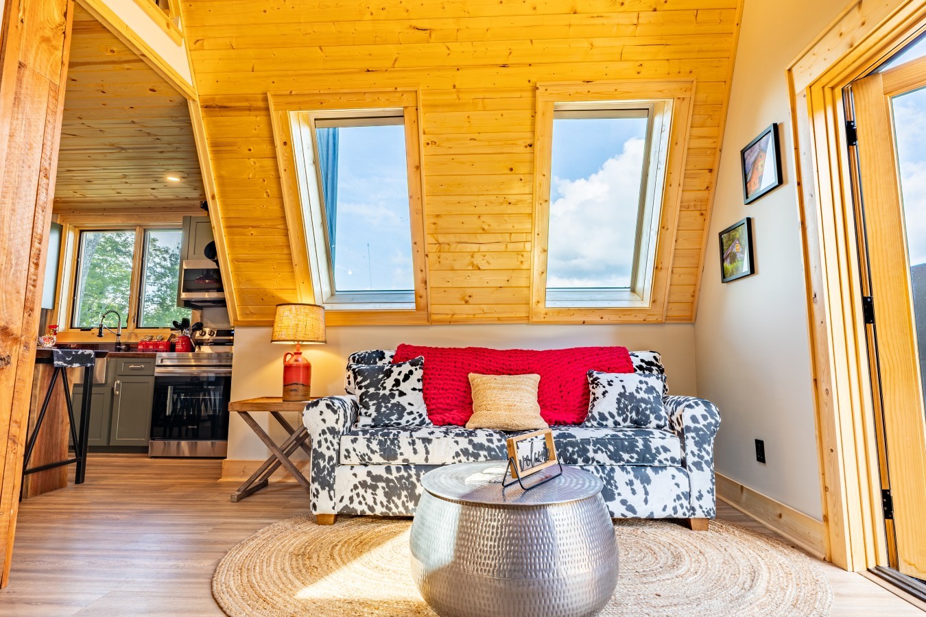 Living area with skylights and view into the kitchen