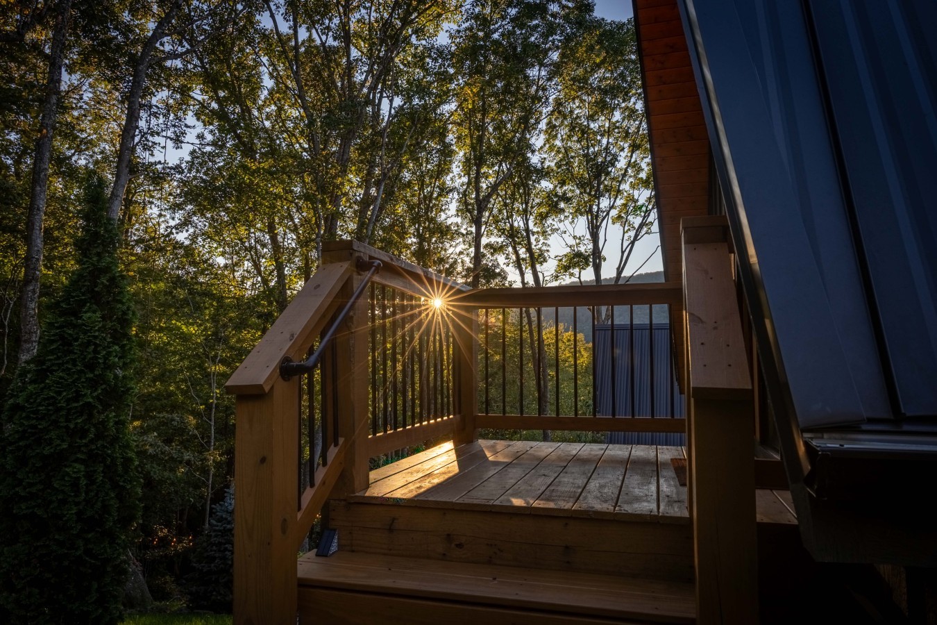 Lit deck steps at sunset