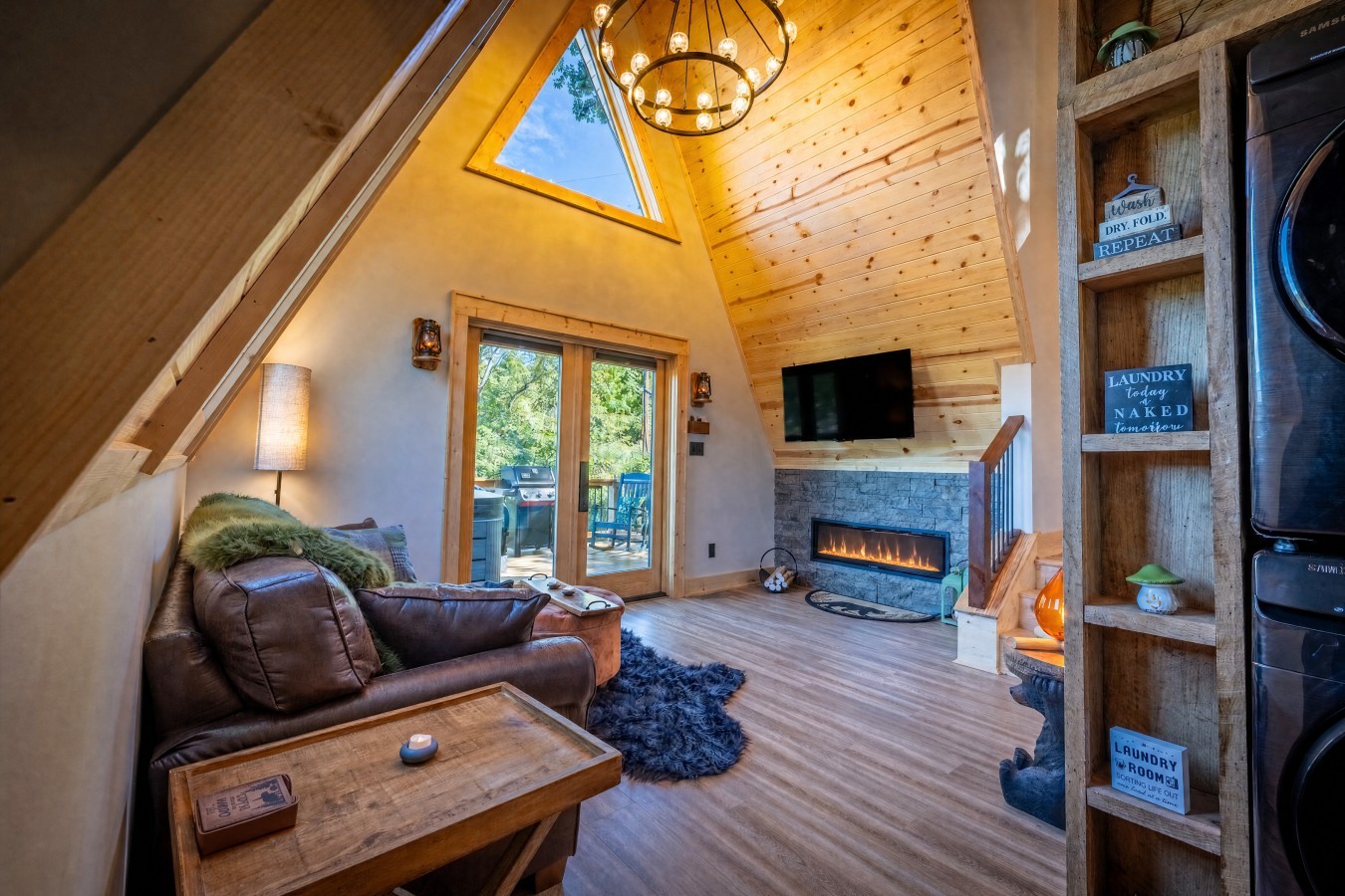 Living room with leather sofa and A-frame windows